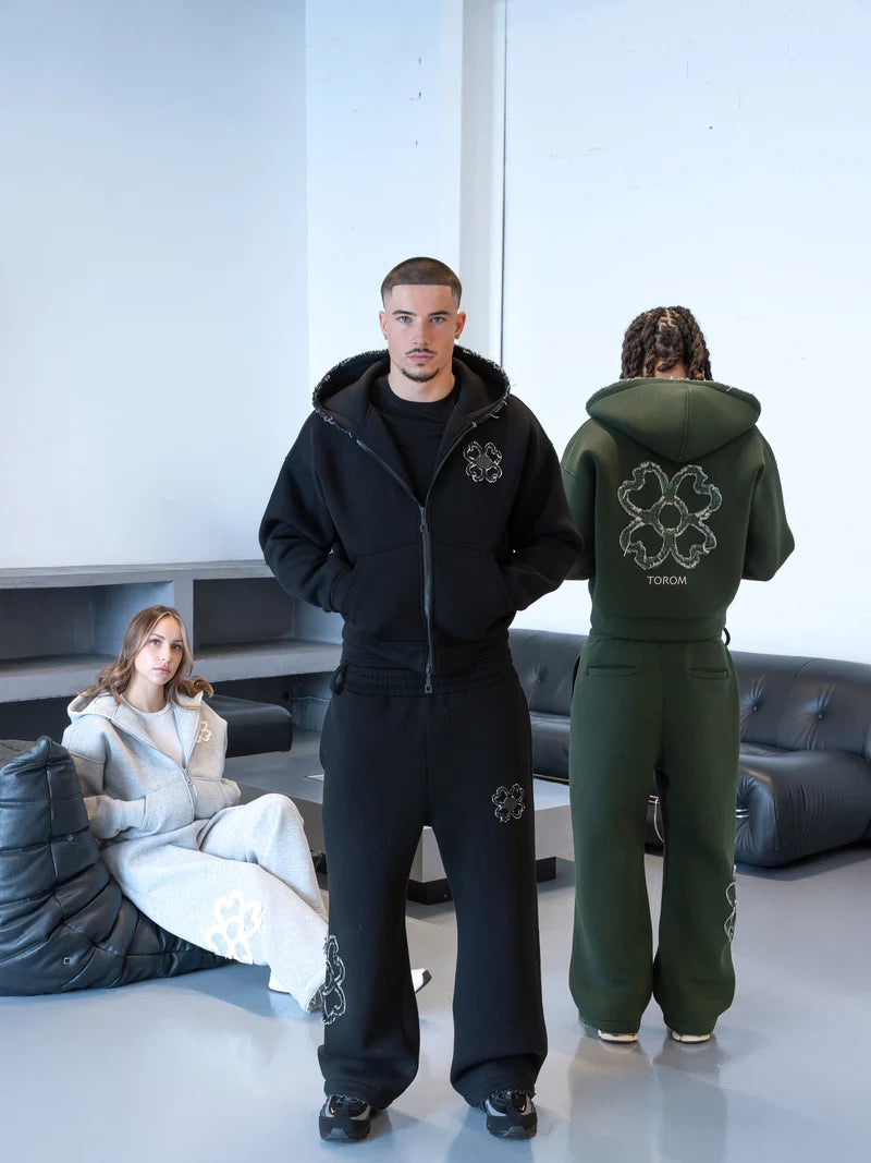 Ensembles TOROM Signature : veste zippée et jogging trèfle en noir, vert et gris